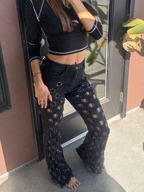 SUPER UNIQUE BLACK FLARE JEANS WITH HOLES